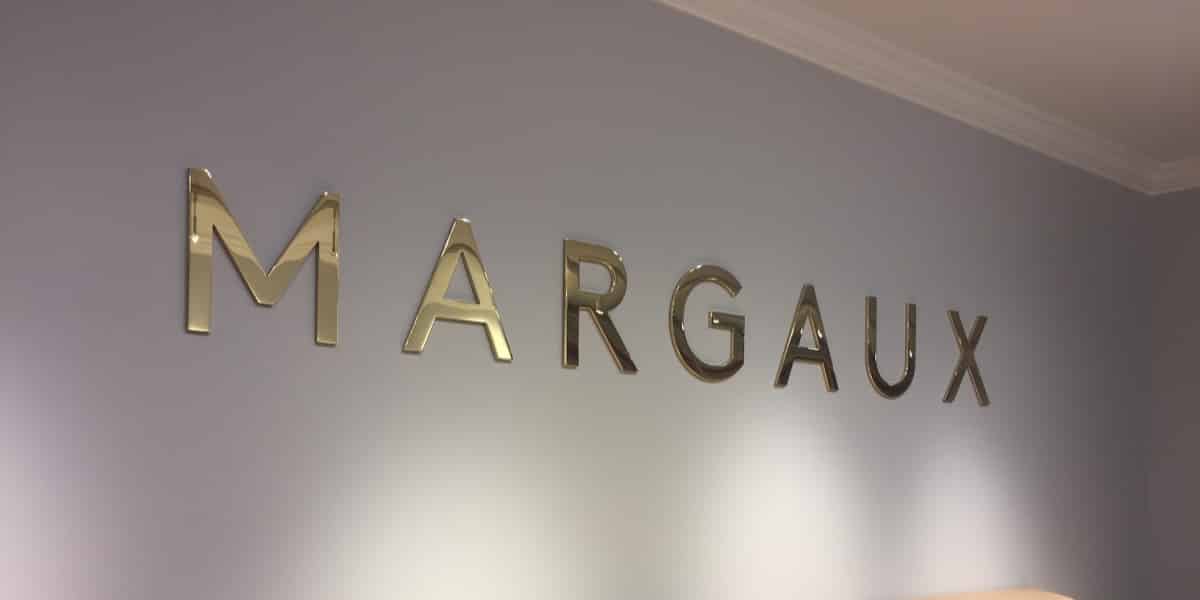 Brass sign letters created for office use with glossy finish